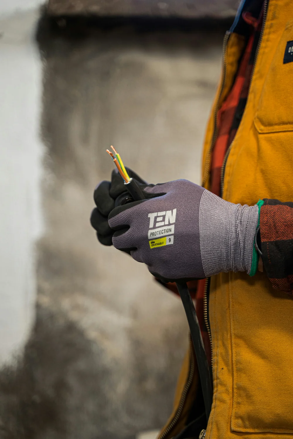 Professional electrician working on an electrical panel in Austin, Texas